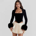 Noirè Square-Neck Velvet Corset Top with Faux Fur Cuffs